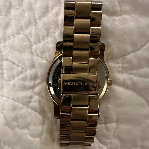 Michael Kors gold watch with stone bezel